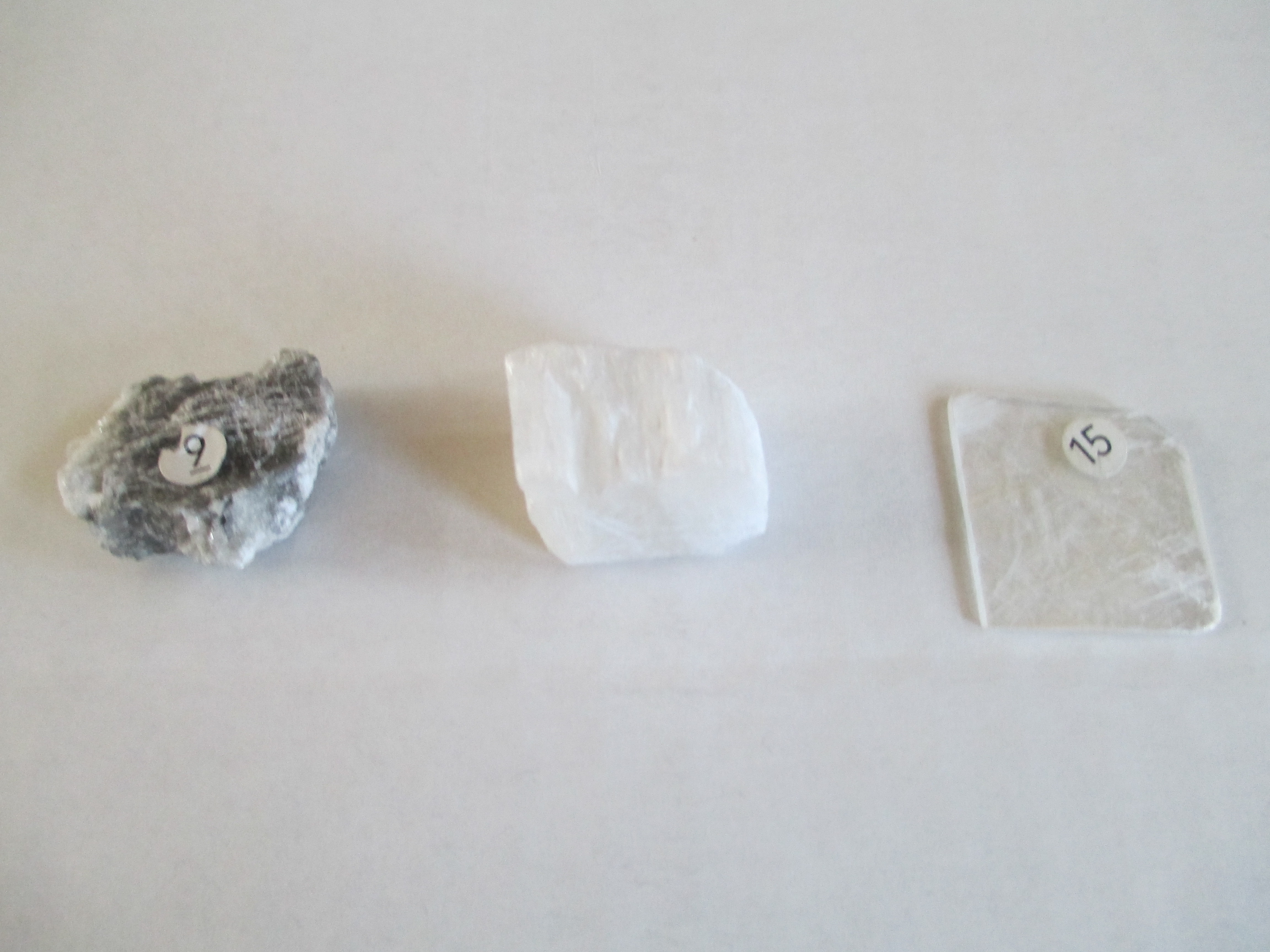 Three types of Gypsum:  Alabaster Gypsum (left), Satin Spar Gypsum (middle), and Selenite Gypsum(right).
Click to see full image.